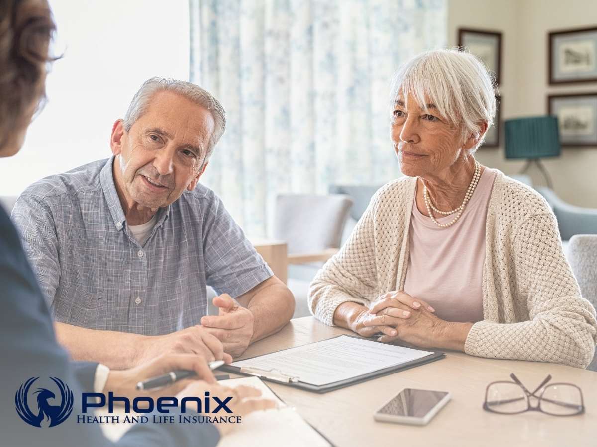 Two middle-aged people learning about hospice care in a medicare plan in Phoenix, AZ.Two middle-aged people learning about hospice care in a medicare plan in Phoenix, AZ.